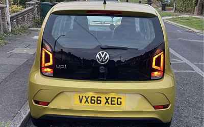 VX66 XEG, a Gold Volkswagen Up parked in Hollingdean