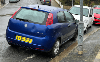 LA56 OCP, a Blue Fiat Punto parked in Hollingdean